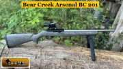 Precision Engineering in a Familiar Platform Sootch00 examines the Bear Creek Arsenal BC-201, a .22 LR semi-automatic rifle that mirrors the classic Ruger 10/22 design. This model features a 16-inch 416R stainless steel bull barrel, enhancing accuracy for target shooting and small game hunting. The heavy barrel design contributes to improved shot stability and consistency....